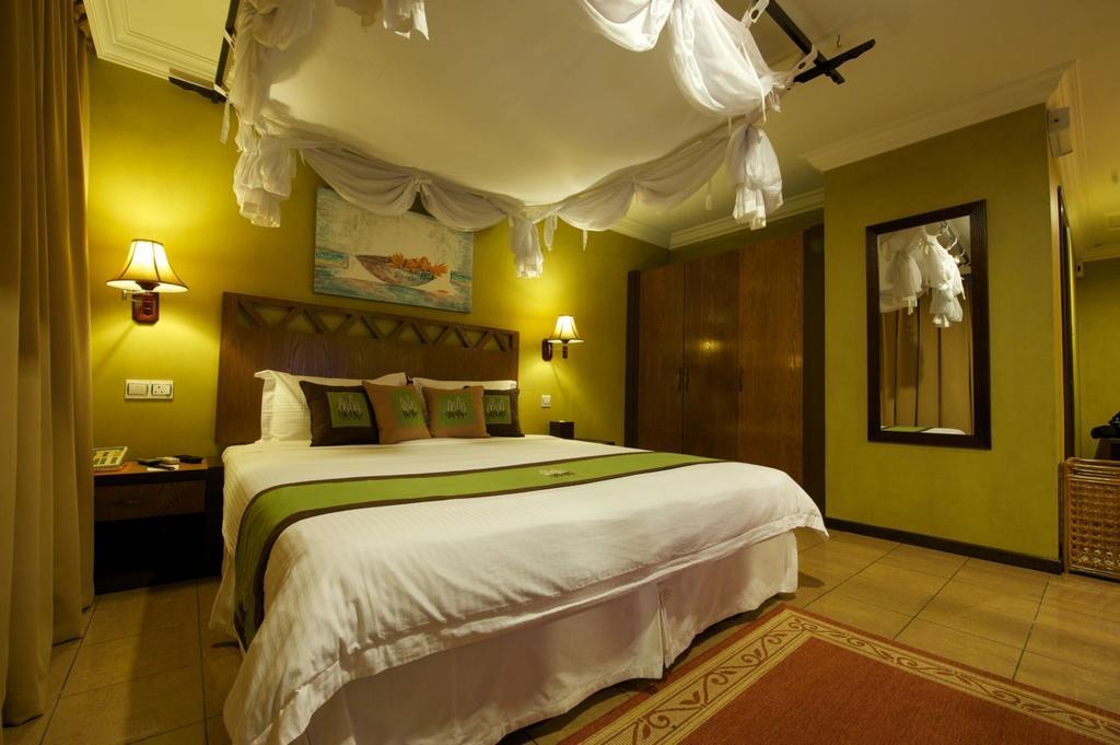 Heritage Hotel Тавау Стая снимка